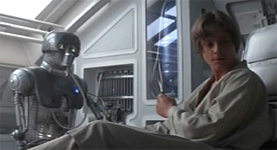 Ein 2-1B Droide (links) behandelt Luke Skywalker.